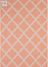Coral-colored ecology outdoor rug orange with a repeating white quatrefoil pattern perfect for outdoor spaces