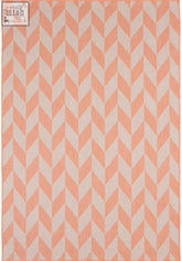 A peach and cream chevron-patterned ecology outdoor rug with woven texture in outdoor rug orange color