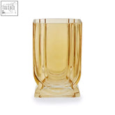 Edan small ochre yellow glass vase with translucent amber glass and vertical fluted ridges on a square base