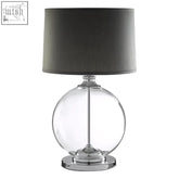 Edna glass table lamp with clear globe base and dark gray linen shade with chrome finish base