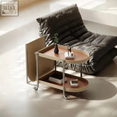 Edna side table trolley with movable double deck, stainless steel frame, and tan bridle leather shelves with beige fabric sides