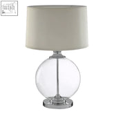 Edna small round glass table lamp with clear globe, chrome base, and ivory silk shade for stylish lighting