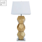 Eleri gold glass table lamp with gold geometric base and white rectangular shade perfect as a glass table lamp