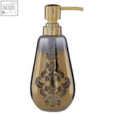 Elissa gold ombre soap dispenser with gold-toned pump and gradient glass body featuring black damask pattern