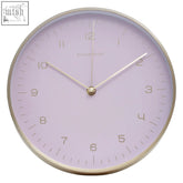 Elko gold and pink finish wall clock with a round lavender face gold finish metal numerals and silver frame