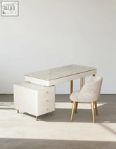 White marble top elmer office desk with gold legs paired with beige velvet chair for stylish office desk setup