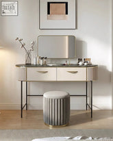 Modern elmore dressing table with cream drawers, gold handles, curved design, and vertical ribbed side detailing
