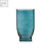 Emer small blue glass vase with a translucent teal blue glass and subtle textured surface on a square base