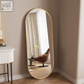 Emi 120x40cm gold metal runway oval mirror with a matte gold frame perfect for full-length views