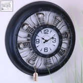 Black metal industrial wall clock with white face silver spring and gear accents resembling airplane engine 40cm