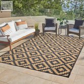 Beige and black geometric patterned enipate outdoor rug with nylon corner loops to reduce slippery accidents and prevent fraying
