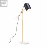 Black cylindrical lampshade floor lamp with brass finish adjustable arm and white marble base for stylish lighting