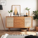 Mid-century modern evadne rattan sideboard in pine wood with cane panel doors and four drawers in warm natural finish