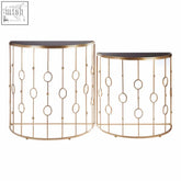 Faiza set of 2 gold-toned metal art deco console tables with half-moon shape and circular decorative accents