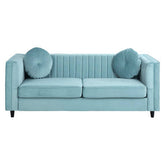 Farah three seater pastel green velvet sofa with tufted round pillows and vertical ribbed back panels in pastel green velvet