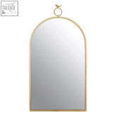 Gold-toned farran bird wall mirror features an arched frame with a delicate bird perched on the circular hanging ring