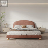 Fatima bed king size plush rose gold upholstered size bed with curved headboard and brass feet perfect for girls