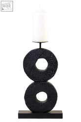 Black textured charred black mango wood log candle holder with a white pillar candle for decor use