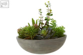 Gray textured ceramic stone effect pot filled with mixed green and purple succulent plants for indoor decor