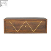 Dark wood floating chestnut brass bedside table drawer with geometric gold inlay and round brass knob in mango wood