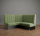 Modern l-shaped flutes bench seating unit in soft sage green fabric with vertical pleats and black base