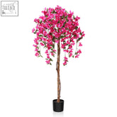 A vibrant pink fopamtri artificial blossom tree with lush green leaves in a sleek black pot for home decor