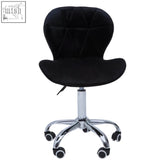 Black velvet office chair with quilted design chrome base and casters perfect for home office use