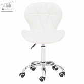 White velvet office chair with quilted leather upholstery and chrome base with casters for home office use