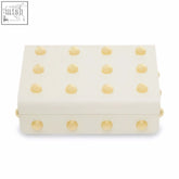 Frida small cream rectangular gold trinket box with evenly spaced golden studs on top and sides