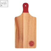 From scratch red and natural acacia wood serving board with circular handle hole perfect for scratch chopping