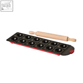 Black and red silicone ravioli tray with wooden rolling pin for making fresh pasta from scratch