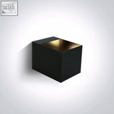 Black cube-shaped decorative wall lights with gold interior lining made of aluminium for stylish wall lighting