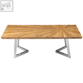 A sleek natural bamboo coffee table with a sunburst wood top and modern chrome triangular legs perfect for dining rooms