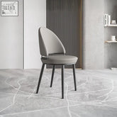 Modern gray upholstered gareth dining chair with sleek black metal legs perfect for stylish dining spaces