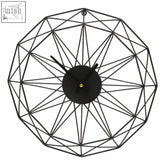 Genova small black metal wall clock with minimalist black metal wireframe design and central black face