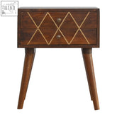 Dark wood geo brass inlay bedside table with two drawers and brass knobs featuring a geometric pattern
