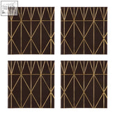 Set of four prism black and gold coasters with dark brown faux leather and geometric gold metallic lines pattern