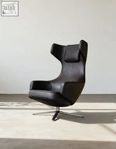 Black leather ghoshal egg chair with chrome base wingback lounge chair with recliner and footstool