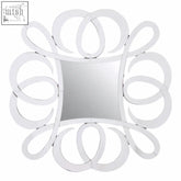 A sleek gladis wall mirror with a square reflective center and polished white metal circular frame design