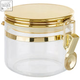 Clear gozo jar with gold lid and clasp featuring a clear body and matching gold band 450 ml capacity
