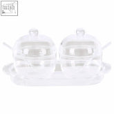Clear plastic condiment pots from gozo set with two round jars matching lids and integrated matching spoons on tray
