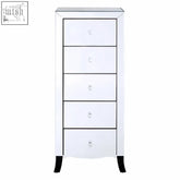 Graciela chest of 5 drawers with mirror frame featuring white drawers cut glass handles and curved black feet