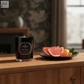Black glass parks london black magic coreless clean-burn grapefruit tangerine 1 wick candle on wood surface