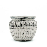 A rustic cream greek clay plant pot with matte silver finish and black textured patterns perfect for plants