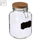 Clear glass storage jar with wooden lid metal clasp and black chalkboard label perfect for kitchen storage jar
