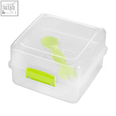 Clear plastic grub tub lunch box with lime green handle and matching spoon and fork set inside