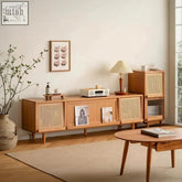 Light wood gwendolyn rattan tv stand with woven cane panel doors and tapered legs for stylish storage