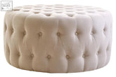 Haley beige velvet round tufted footstool with cream-colored soft velvet and decorative button detailing