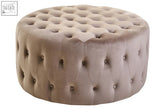 Beige mink velvet round tufted ottoman with button detailing perfect as a cozy footstool