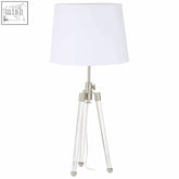 Clear acrylic nickel finish tripod table lamp with a white fabric shade for stylish home lighting